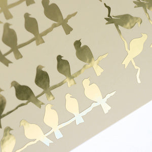 Birds sitting on a tree brach gold foil stickers