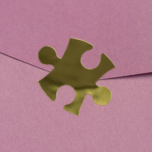 autocollant feuille d'or en forme de puzzle